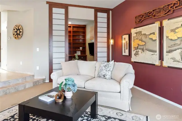 The media room/library with shojo sliding privacy doors is located off the living room.
