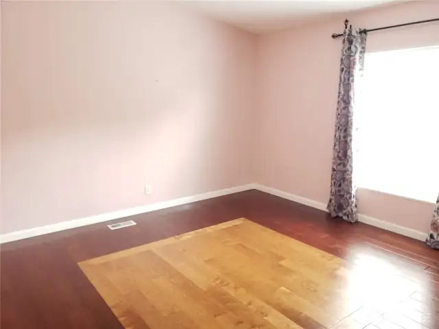 Very Large Second Bedroom with Real Hard Wood Flooring and Trim.