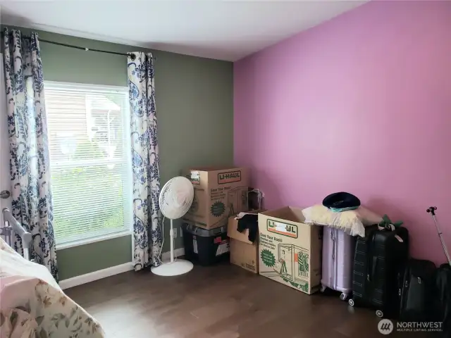 A good Sized Third Bedroom with Hard Wood Flooring and Trim.