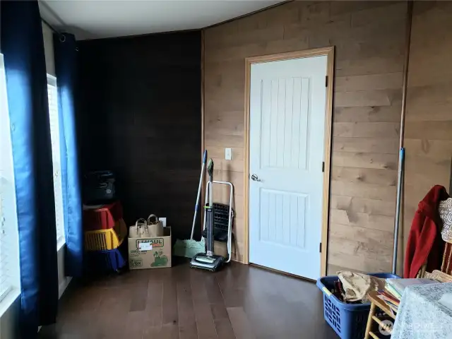 Another Opposite View of the Huge Den/Office/Media Room or another Living Room Area with Hard Wood Flooring. Newer Paint and Trim.