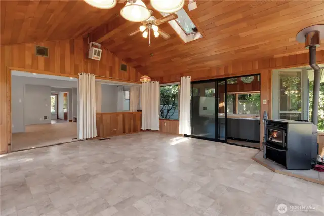 Skylights throughout with ceiling fan, heater, and pellet stove to provide a comfortable atmosphere any time of the year.