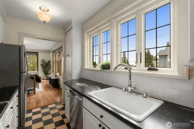 Ivory & Black Tiles to seamlessly blend with the Classic Era of the Home.