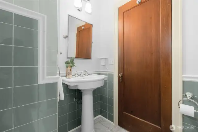 Hallway Bath right at the Entry, with Original tile work!
