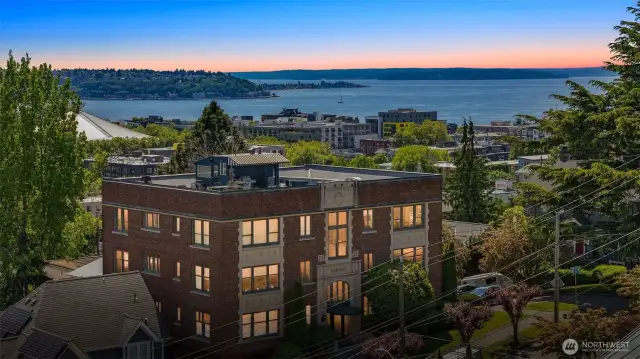 Watch the Sun rise over the City and Set over the Sound.
