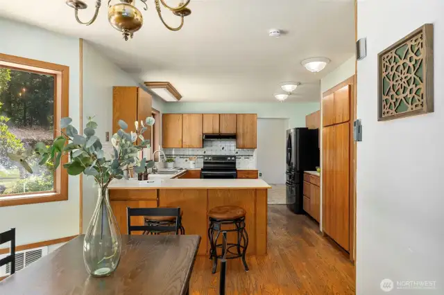 Open kitchen which flows into the bonus living space.