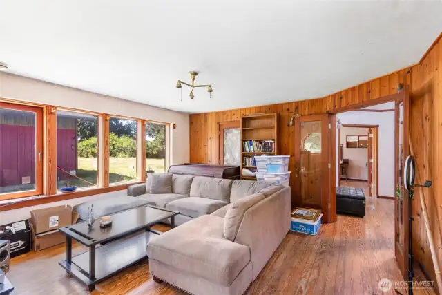 ADU living room, look at all of those south facing windows.