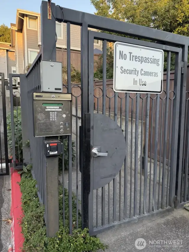 Secured walk in gate.  Use a code or your fob to open when you live here.