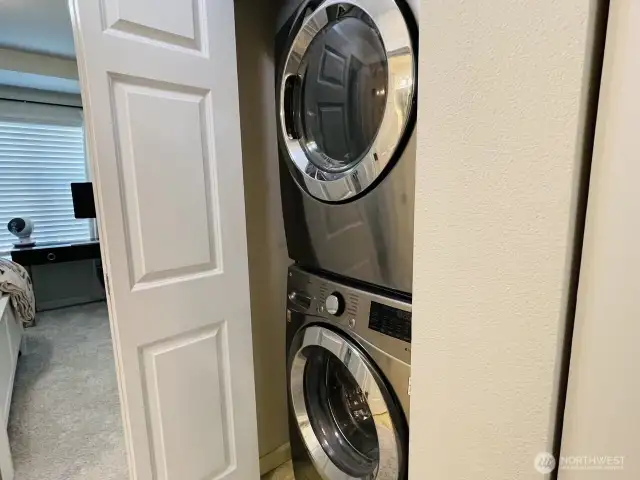 Full sized washer and dryer upstairs between bedrooms