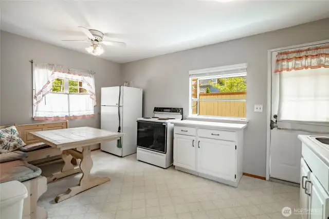 Kitchen with eating space. Another outdoor entry here.