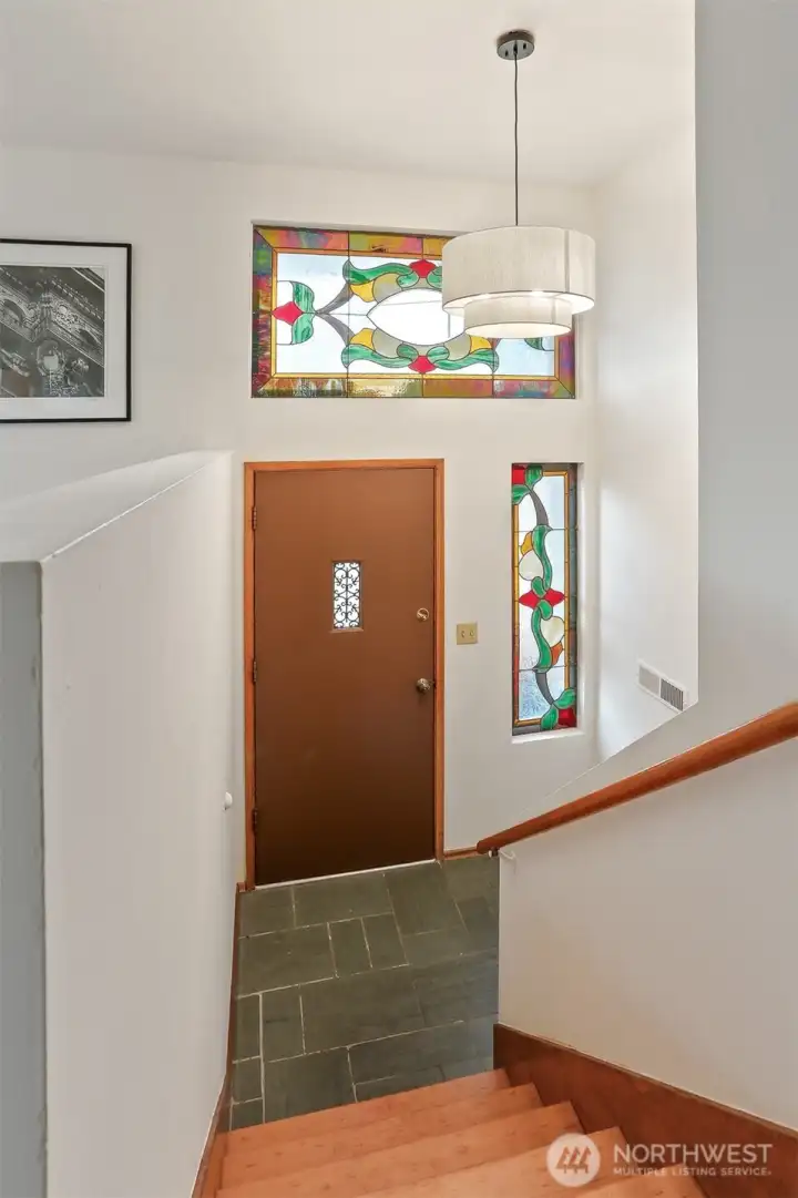 Original slate entry with stained glass removable panels