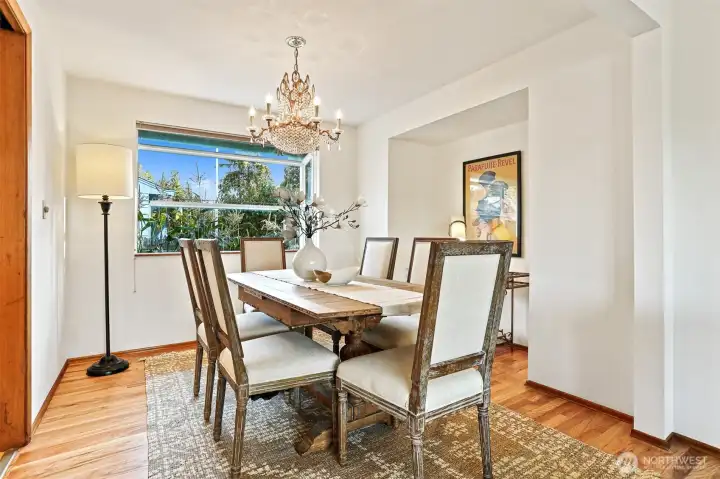 Formal dining room with crystal chandelier, Buffet nook and bay window
