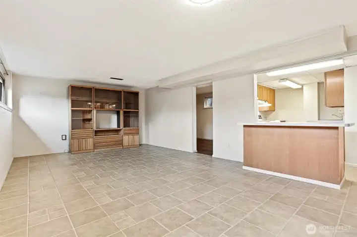 ADU has kitchen, non-conforming bedroom and 3/4 bath access to LL family room and laundry