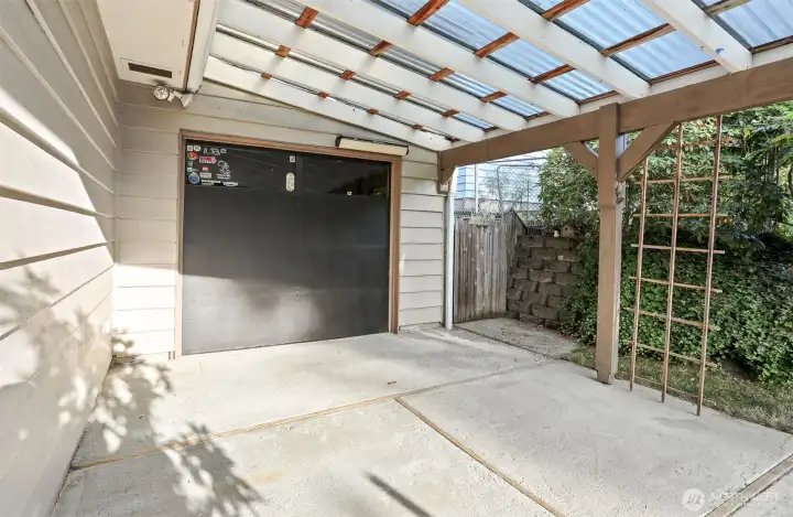 Backyard facing east. RV has a garage door that open to the backyard. How fun!