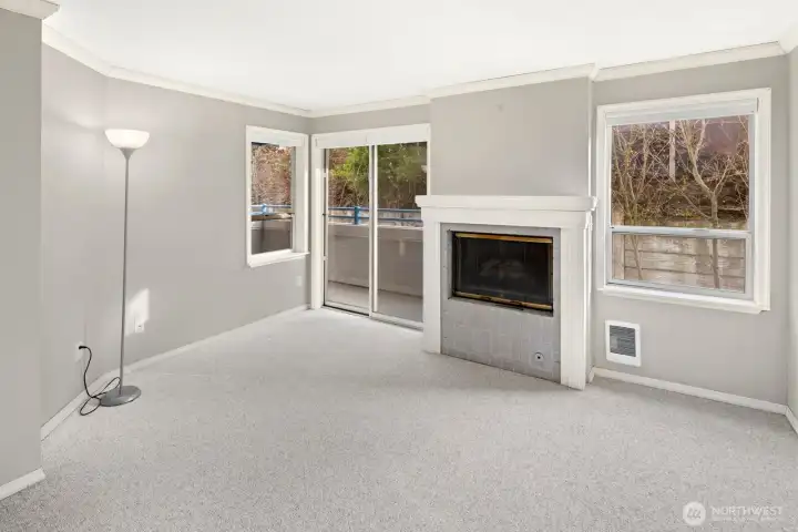 Living Room With Gas FP & Balcony Access