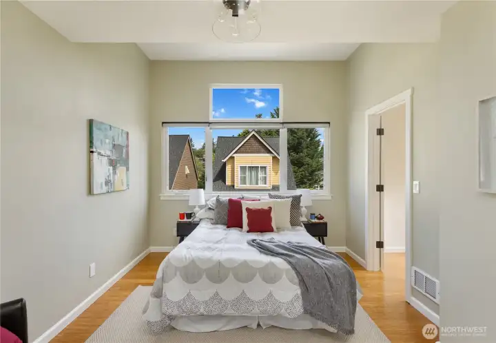 High ceilings with large windows for natural light plus a walk in closet.