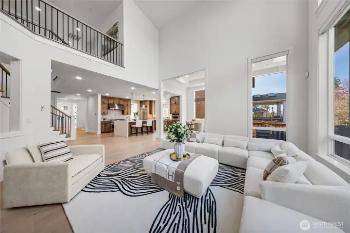 Two-story high ceiling make your living space feel light and airy.