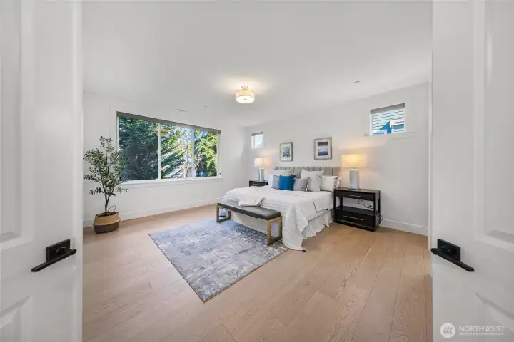 Spacious guest suite on main floor with its own ensuite bath.