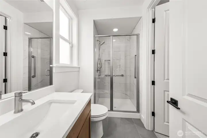 Private bath off the guest bedroom on main floor.