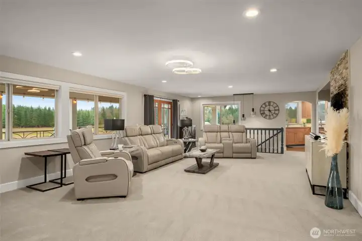 Spacious main-level living area with open layout and abundant natural light.