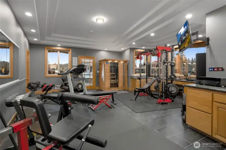 Dedicated fitness room with space for full gym equipment or can be used as a bedroom.