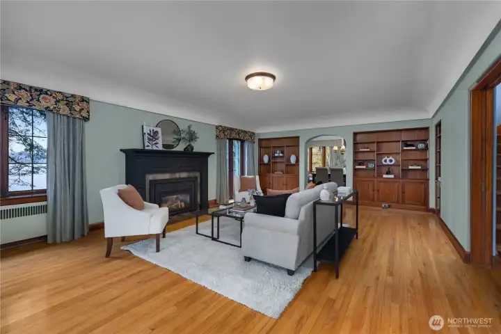 Rich in character and scale, the living room blends historic architecture with meticulous maintenance and refined comfort.