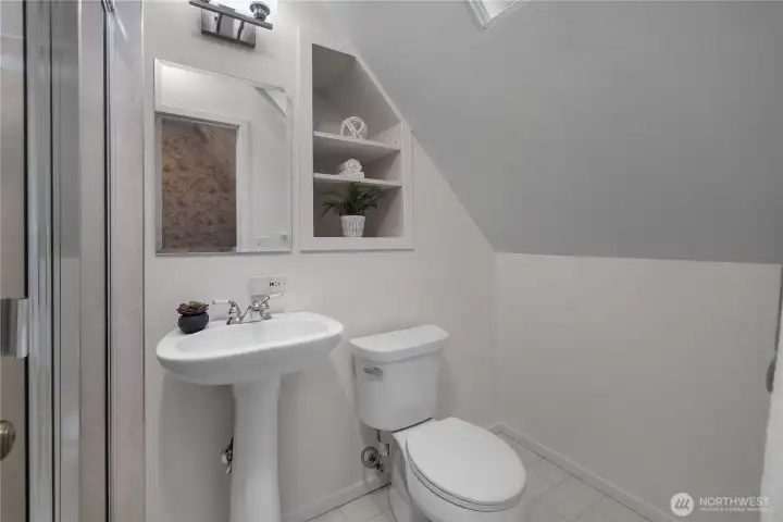 Jr Suite 3/4 Ba - Clean, bright, and efficiently designed, this bath provides a fresh and functional complement to the upper-level 2nd suite.