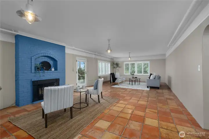 Lower FR - Warm, inviting, and full of character, this spacious lower-level living area features a fireplace and easy access to outdoor spaces.