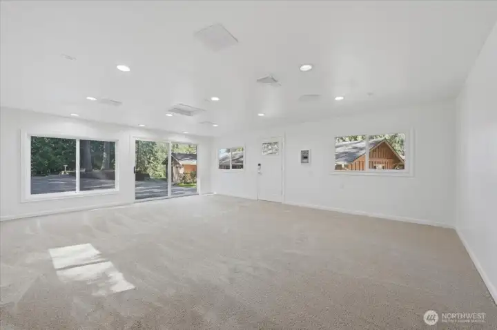 The interior of the office / studio outbuilding consists of one large area amendable to multiple uses. Did anyone say 'home gym?'