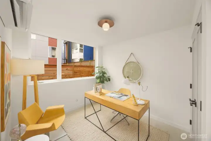 The ground level offers a bed & bath- making for a perfect guest suite or home office!