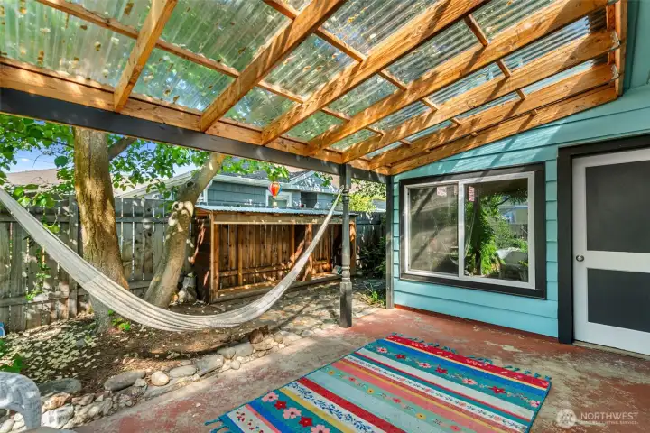 Covered porch leads to studio