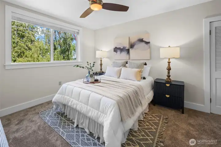 Large primary suite with two walk-in closets.