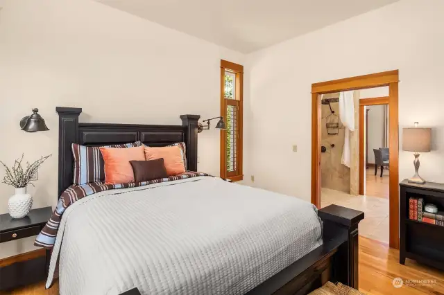 Large closet and W&D are features in this main floor bedroom with outside entrance.