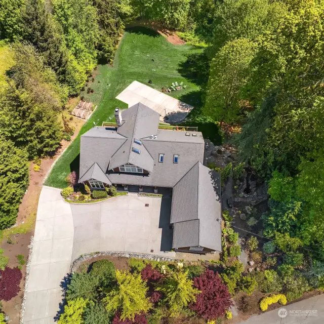 4.5+ Acres include raised beds and many future options for this Craftsman Estate.