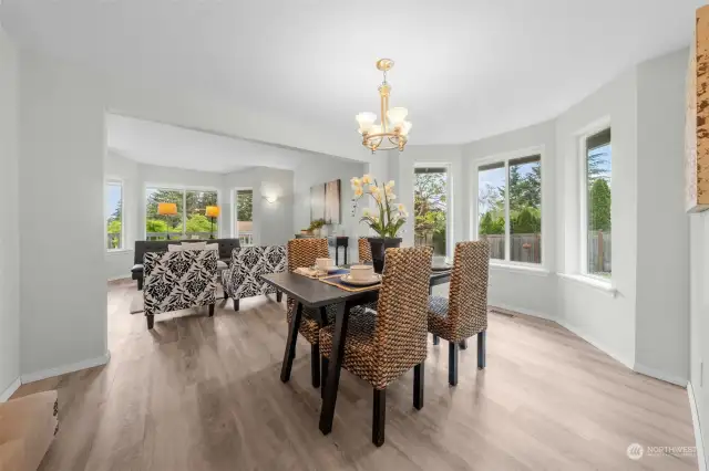 The formal dining area offers plenty of room for a larger table and additional seating.