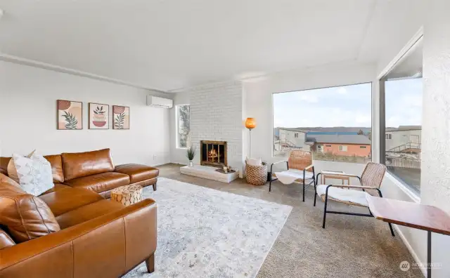 Living room with large windows offering expansive views.