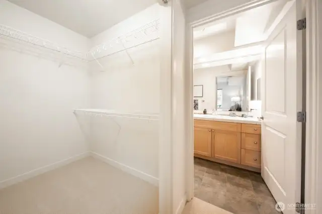 Large walk in closet with built in wall safe