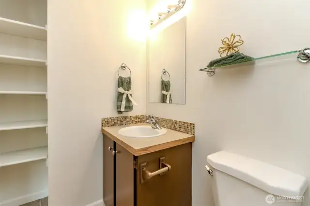 Full Bathroom with linen area