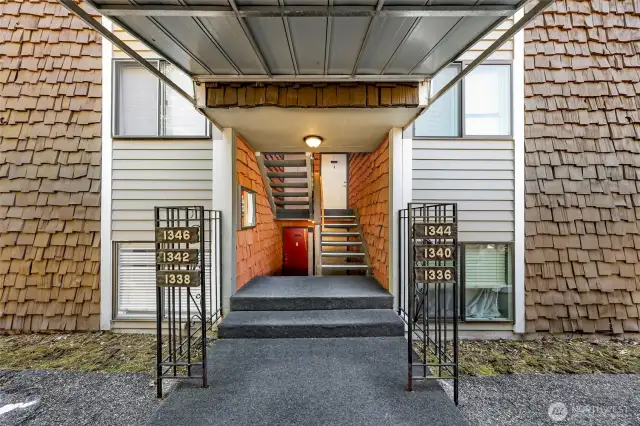 There are minimal steps to enter into your ground floor unit, located on the left. Your private parking space is located directly in front of the unit, as well as additional exterior storage.