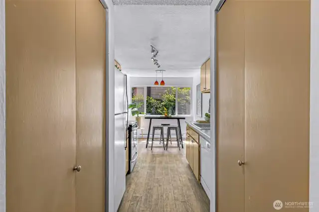 A pantry is located on the left. The new water heater is in the closet on the right.