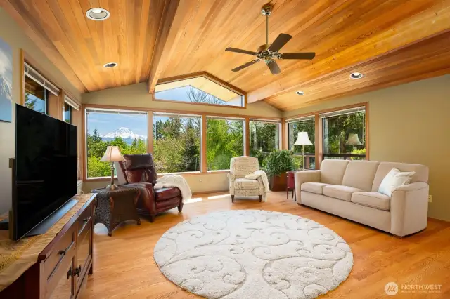 Cedar-lined vaulted ceilings with all windows looking out towards the mountain.