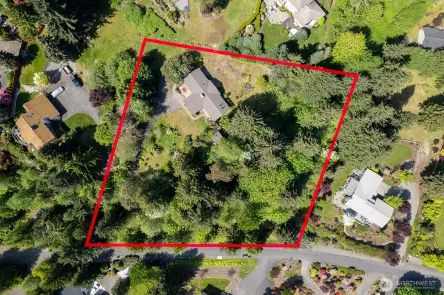 Over two acres of private living.