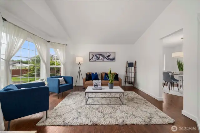 Bright & beautiful w/ vaulted ceilings & warm hardwoods