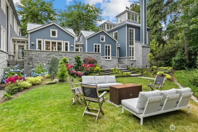 entertainment area with outdoor firepit
