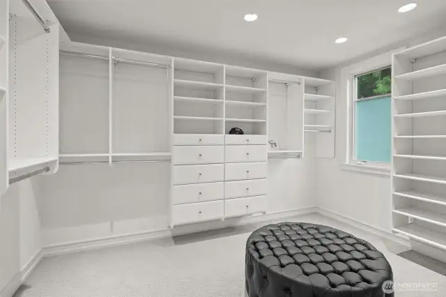 walk in closet with built in shelving