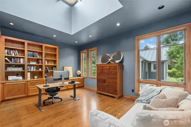 Used as office but counts as upper level bedroom with hidden closet in bookcase