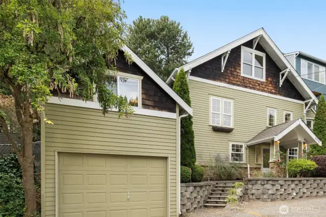 Corner lot, one car detached garage with bonus room on upper level