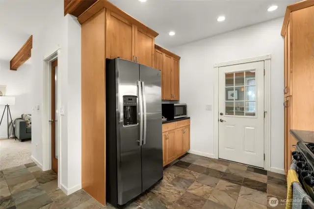 Door leads to mud room off of kitchen