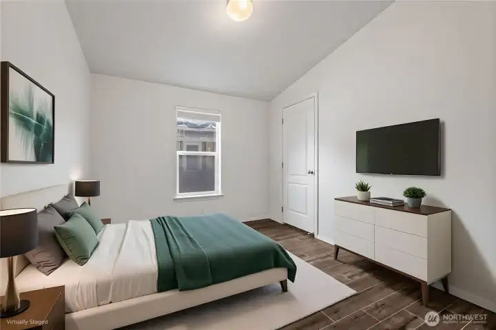 Virtually staged secondary bedroom.