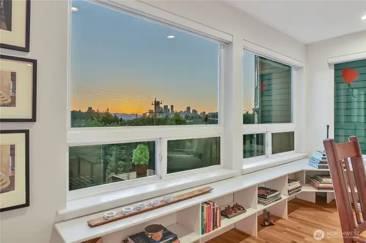 Low shelf is built-in, custom blinds included, hardwood floors have just been refinished!