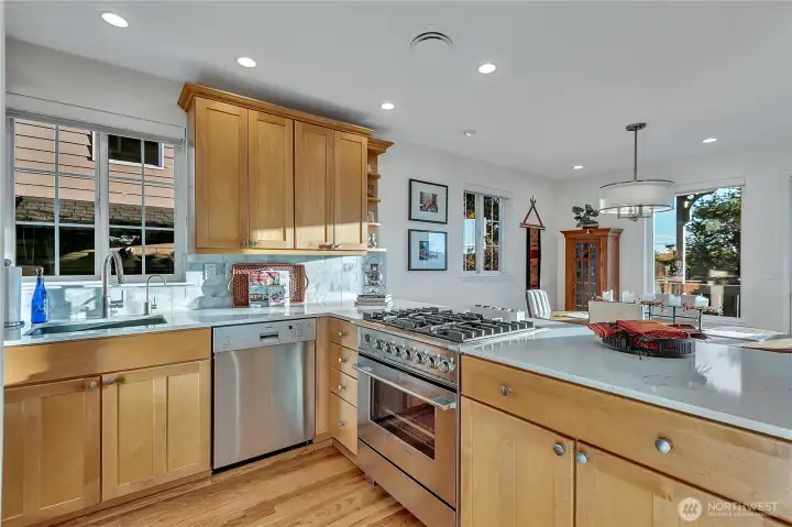 Nicely appointed kitchen with deep single sink, newer appliances and lots of cabinetry.